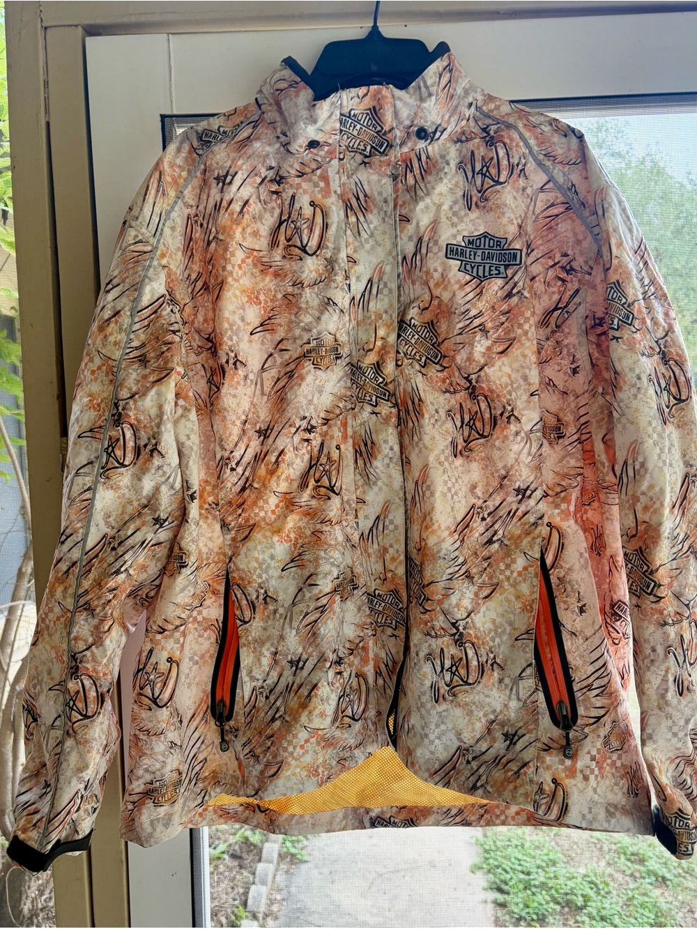 Harley-Davidson Orange & White Camo Print rain jacket and pants.